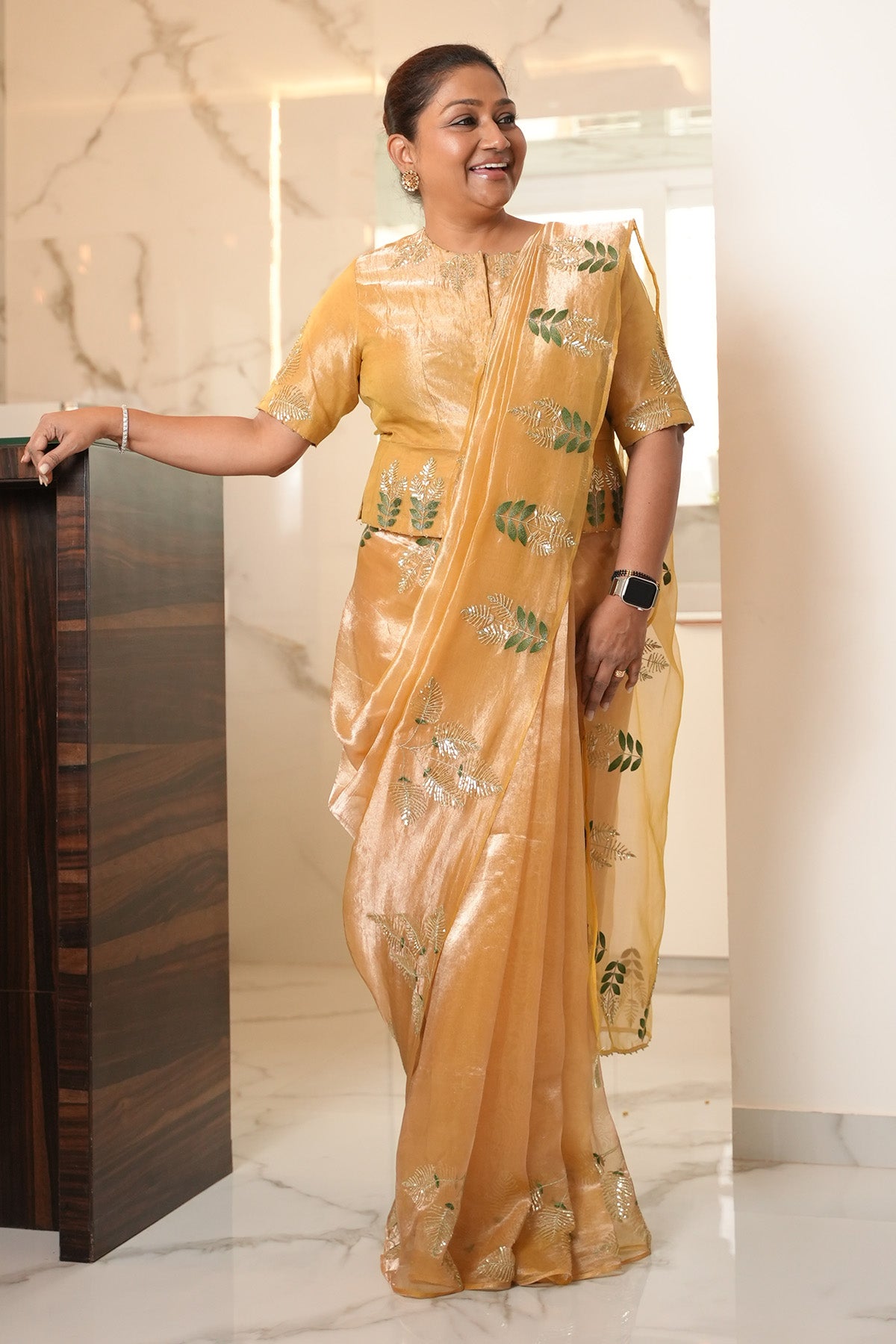 Dolly Jain in Pure Tissue Embroidered Saree and Blouse