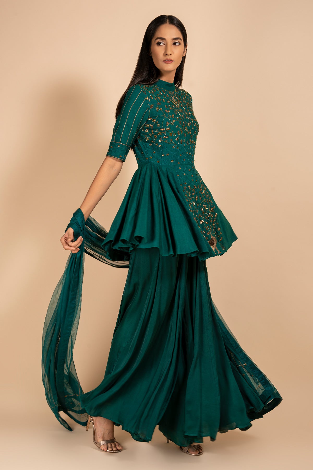 Green Peplum Top Paired With Flared Palazzo Set